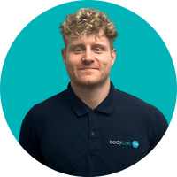 Senior Chiropractor Dan Tomassi (MChiro, MSc, DC) at Bodytonic Clinic London, specialising in sports performance, injury rehabilitation, and spinal health.