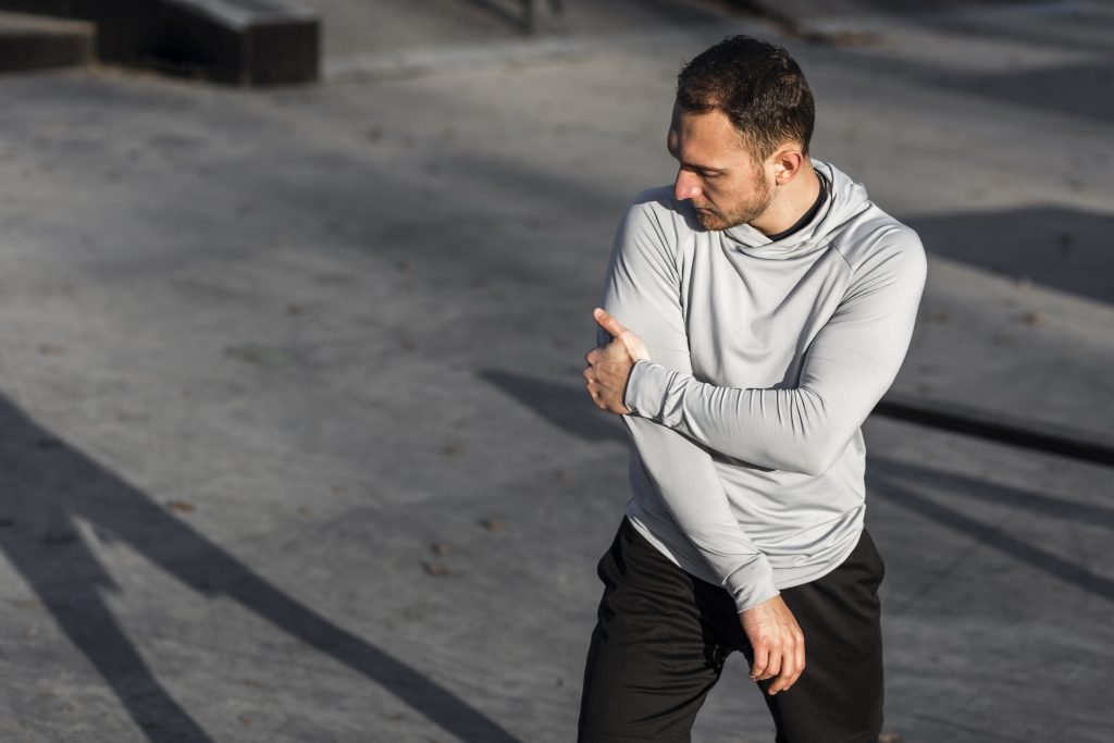 athletic-man-posing-fashion-outside
