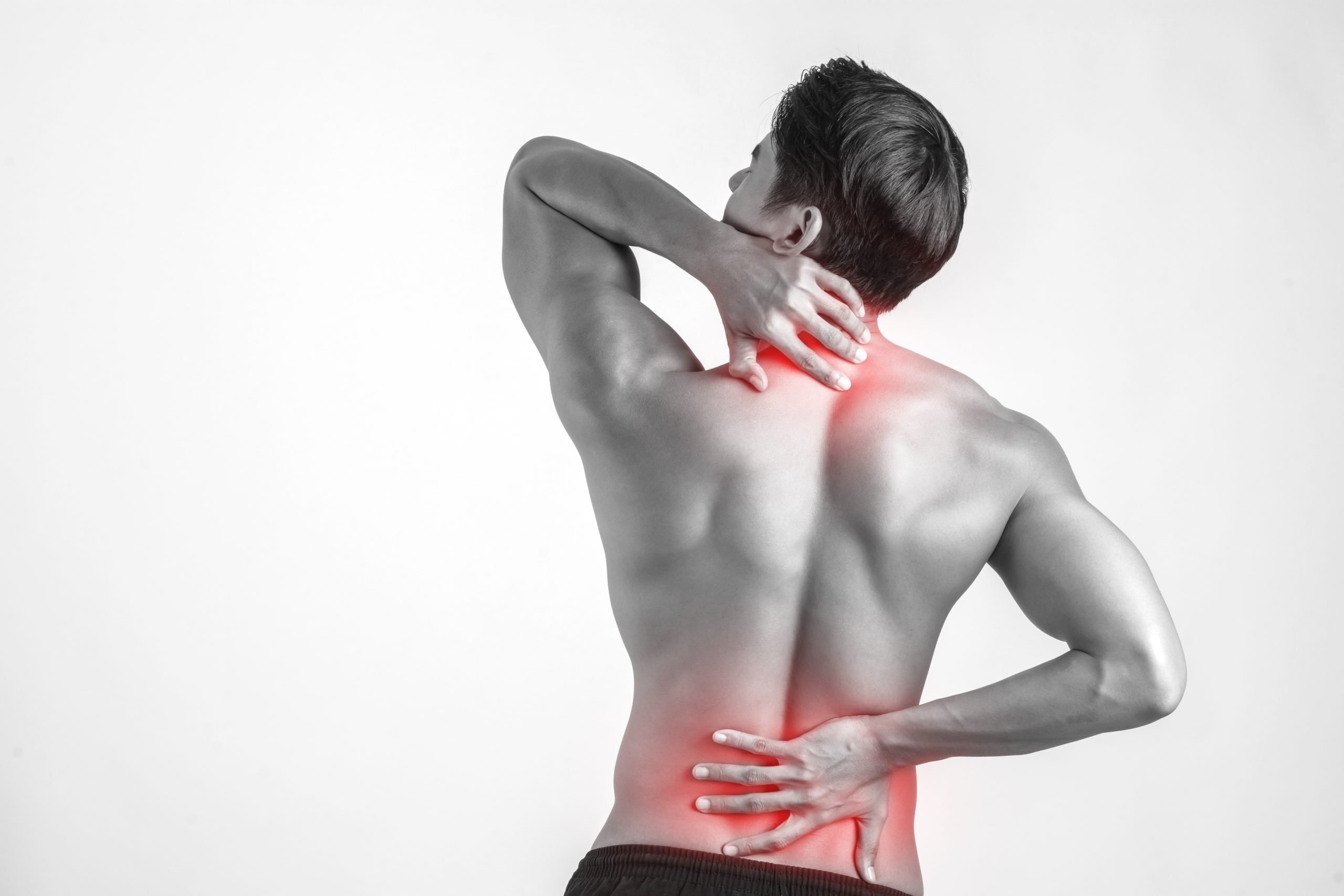 close up man rubbing his painful back isolated white background scaled Cervical Radiculopathy