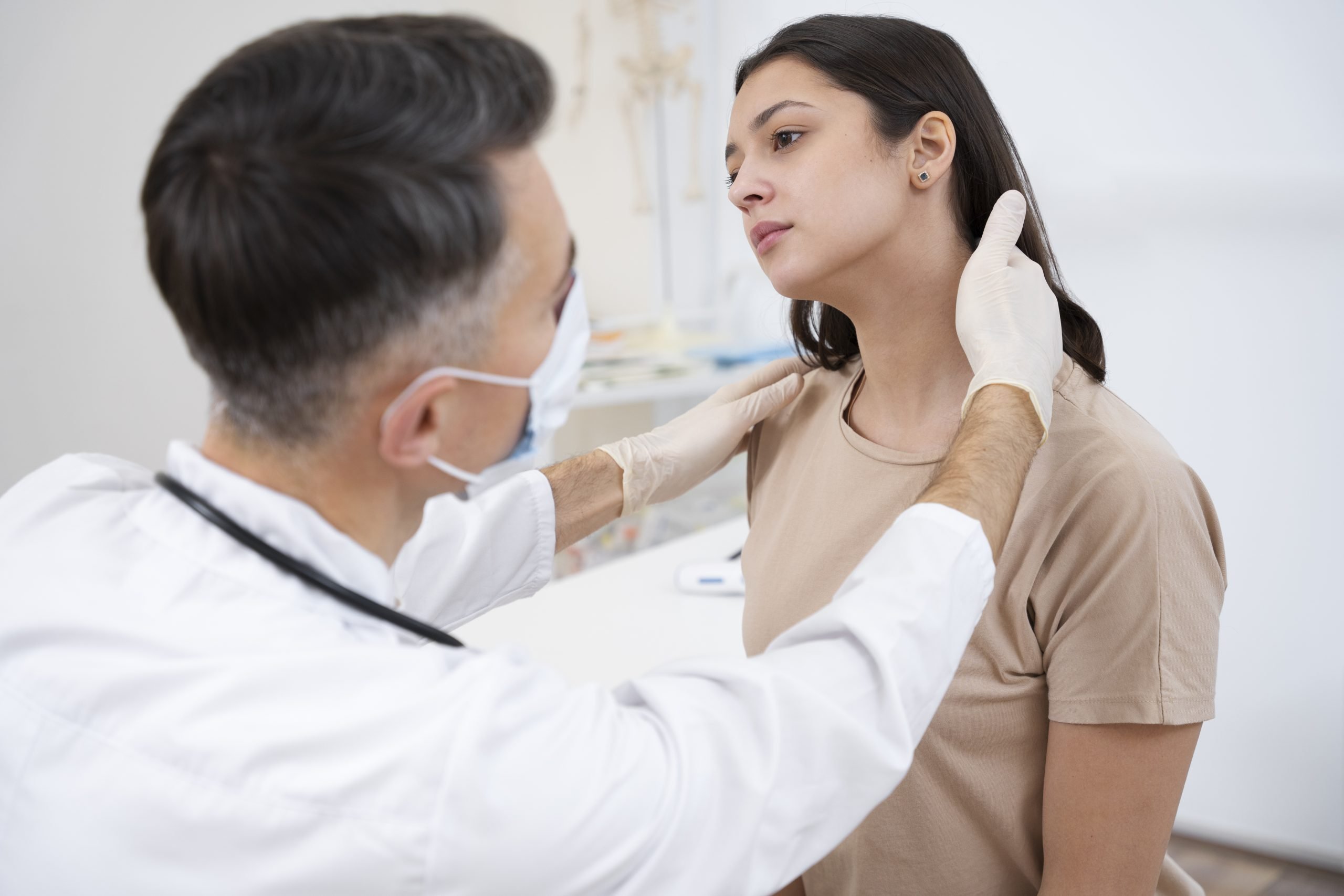 doctor performing routine medical checkup scaled Cervical Facet Pain