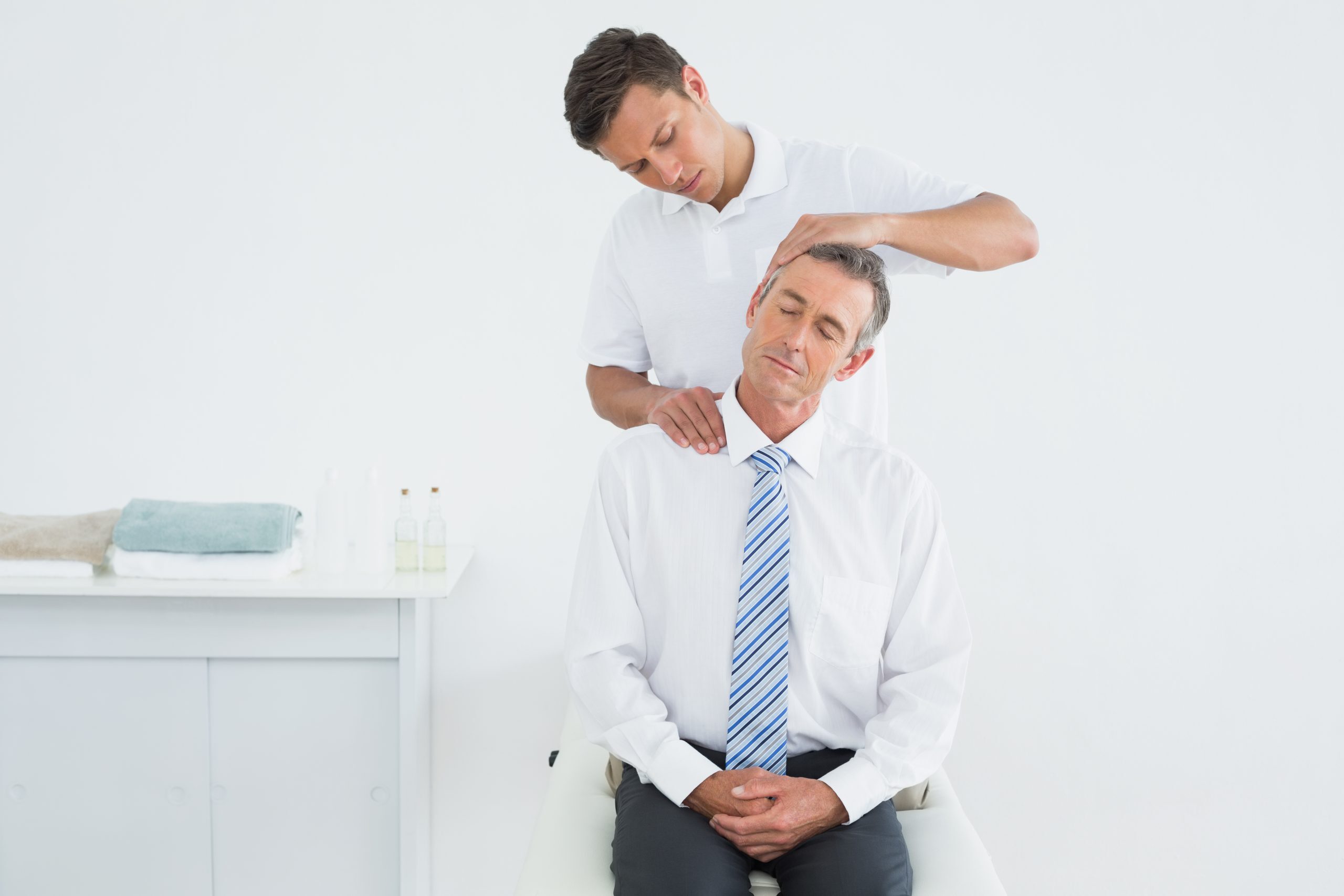chiropractor doing neck adjustment scaled 5 Benefits of Having Chiropractic Treatment for Whiplash