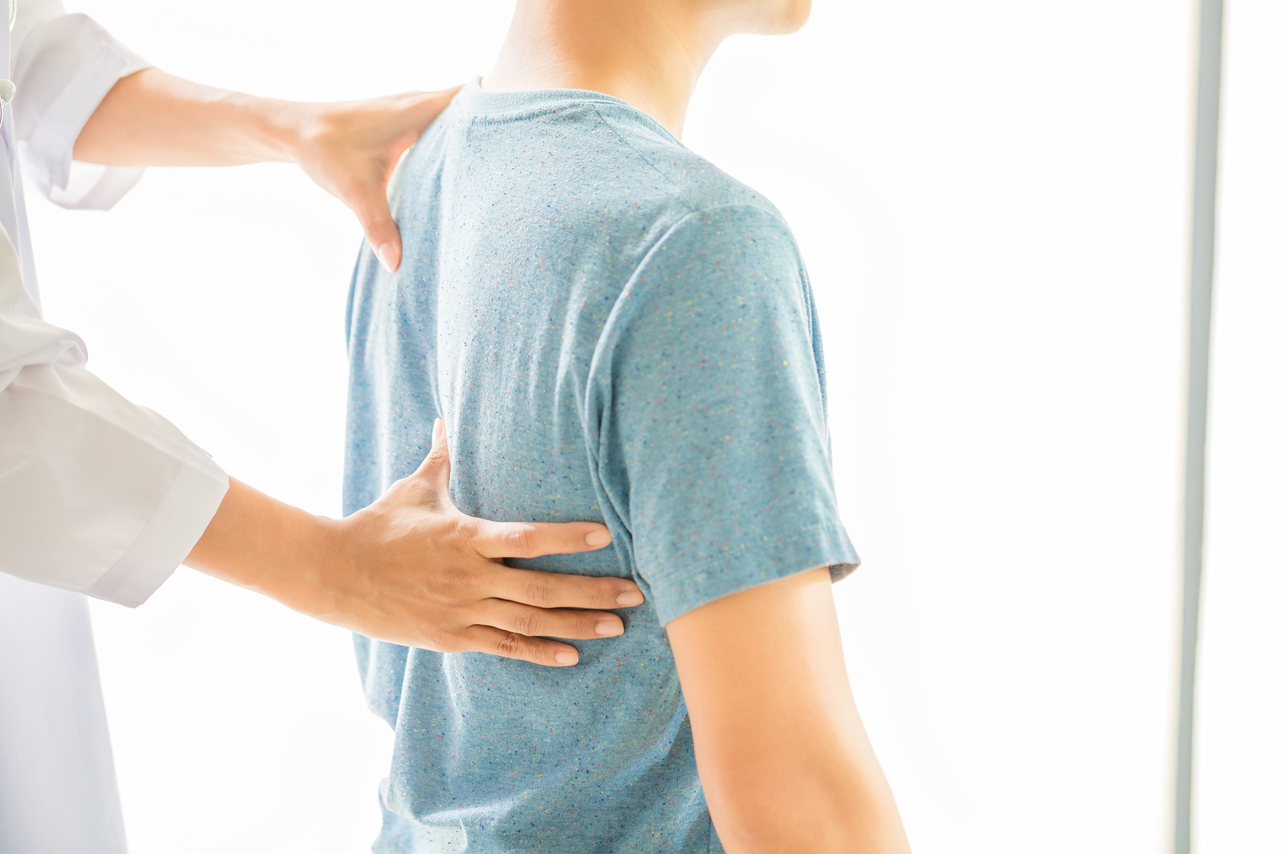 close up physiotherapist working with patient clinic scaled 5 Benefits of Having Chiropractic Treatment for Whiplash