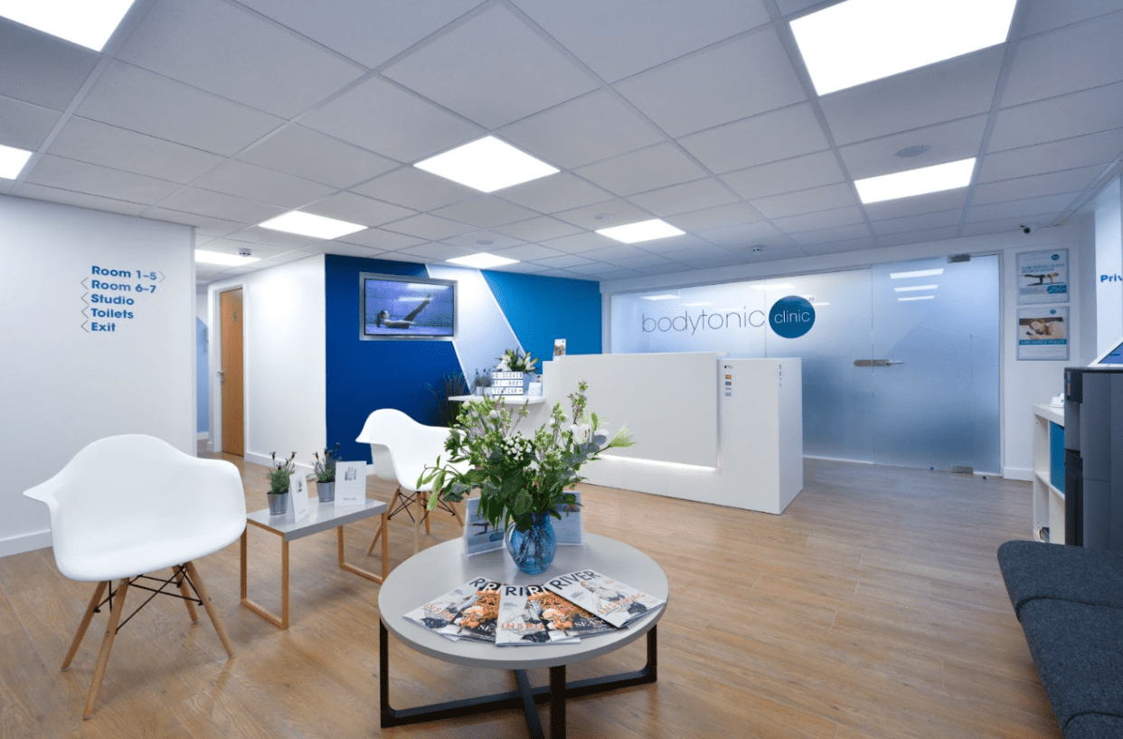Patient receiving focused shockwave therapy treatment at Bodytonic Clinic in London, Canada Water SE16 and Stratford E15 E20 